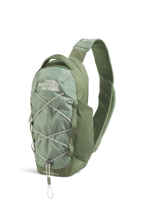 Light green sling backpack.