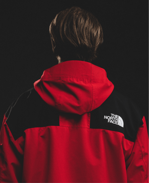 A man in the Mountain Jacket from The North Face.