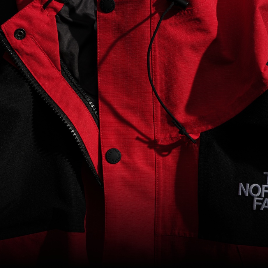 Studio laydown shot of a The North Face DRYVENT Mono Mountain Jacket
