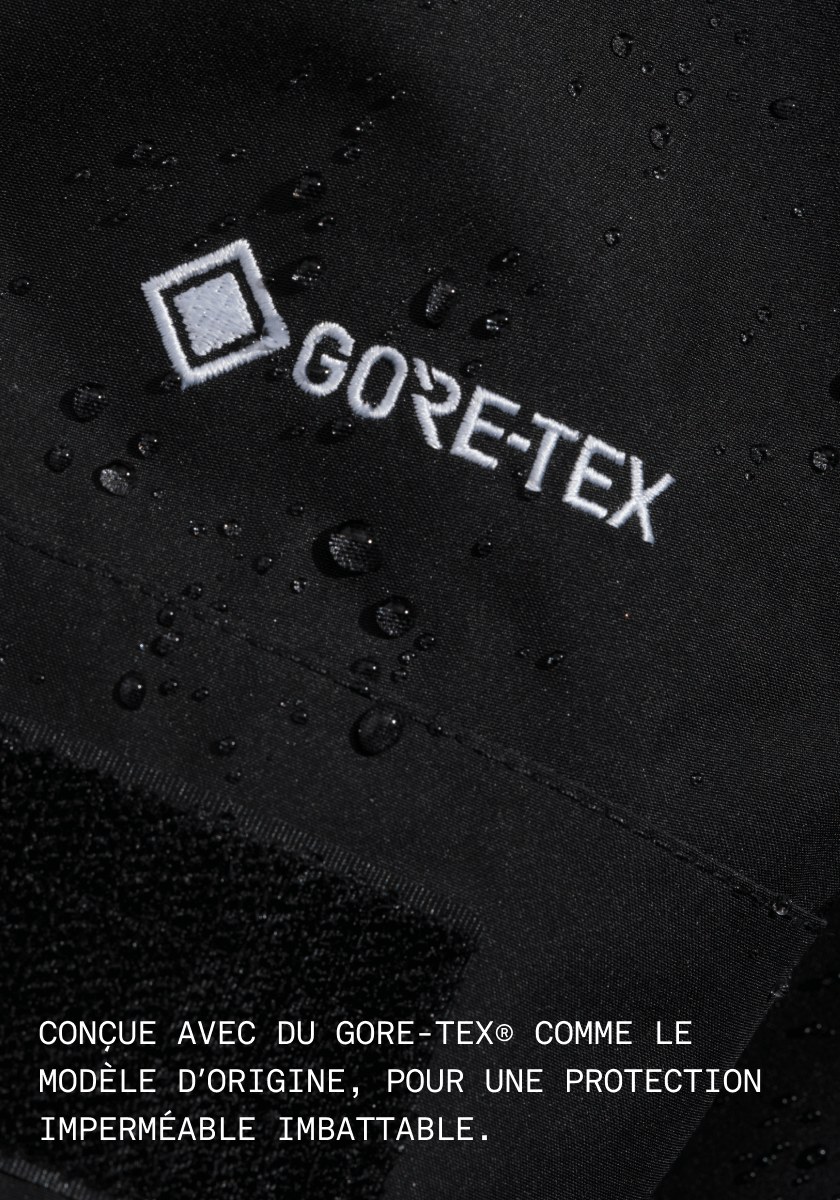 Gros plan du logo GORE-TEX. Texte : Construction avec GORE-TEX® comme l’original, pour une protection robuste et imperméable.