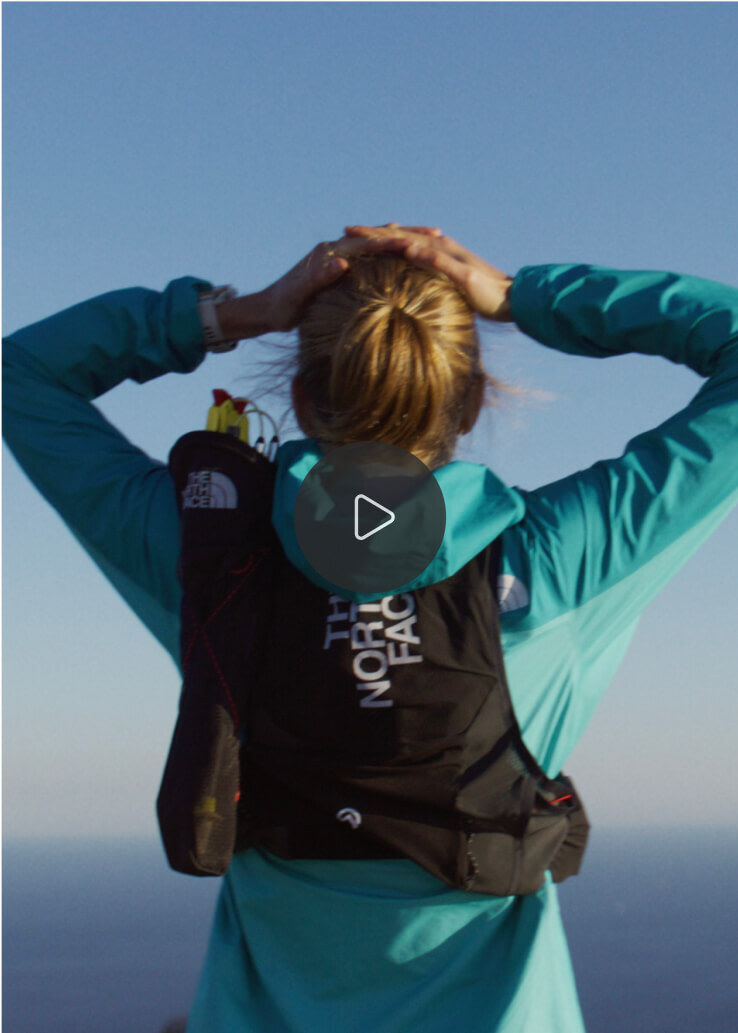 Video thumbnail with play button.
