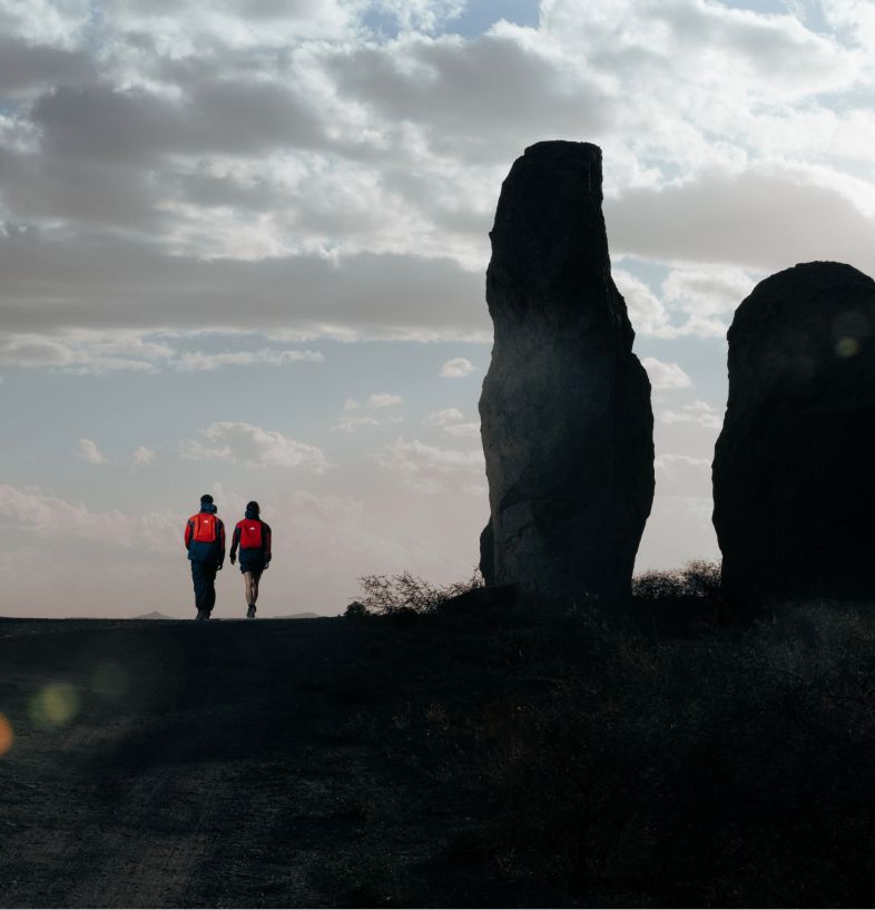 Two hikers wearing SOUKUU™ gear from UNDERCOVER and The North Face