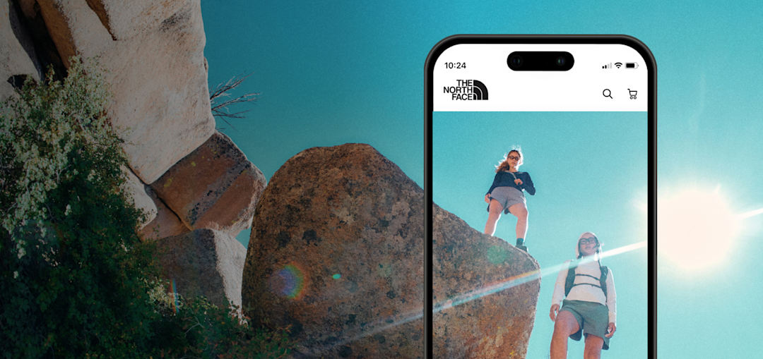 Image of a cell phone screen outlining a hiker walking up a rocky face.