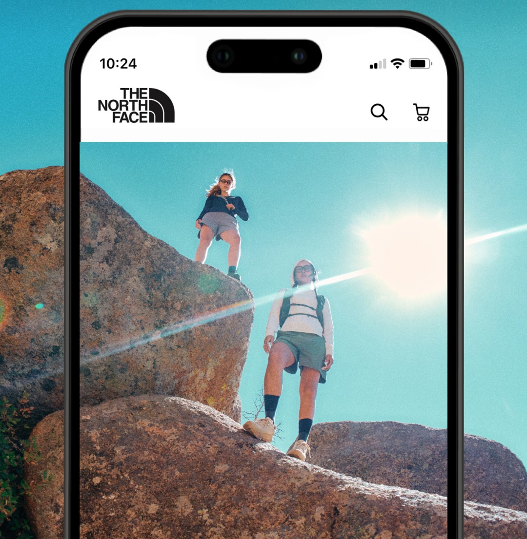 Image of a cell phone screen outlining a hiker walking up a rocky face.