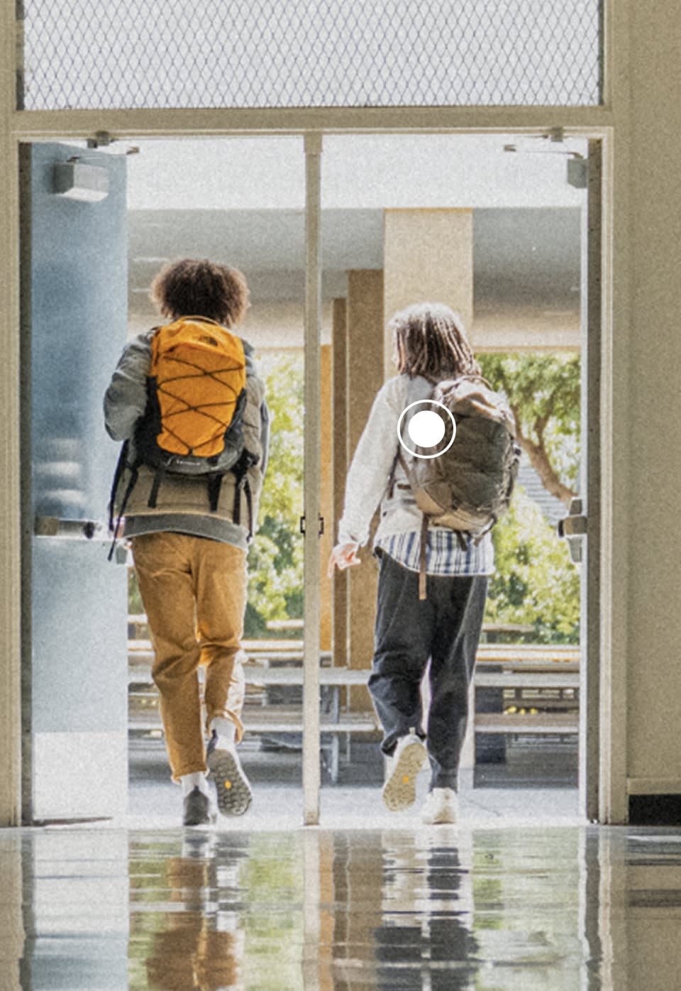 A girl wearing a brown Women's Borealis Luxe backpack from The North Face