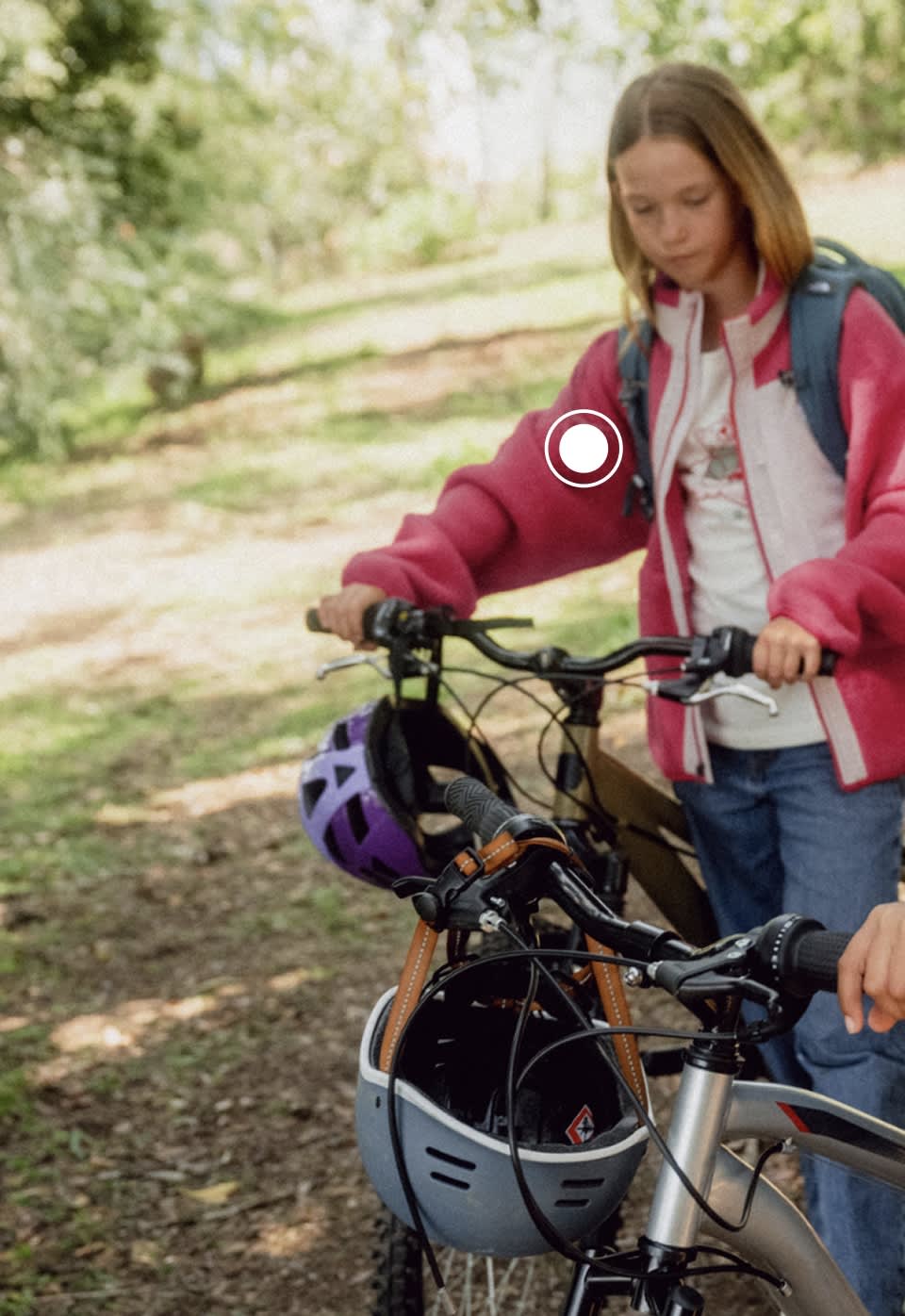 A girl wearing a pink Yumiori jacket from The North Face