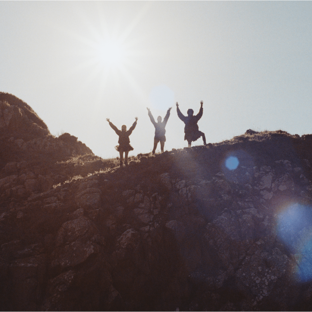 The North Face Athlete Brooke Raboutou is standing in the forest wearing gear from the The North Face x Cecilie Bahnsen collection.
