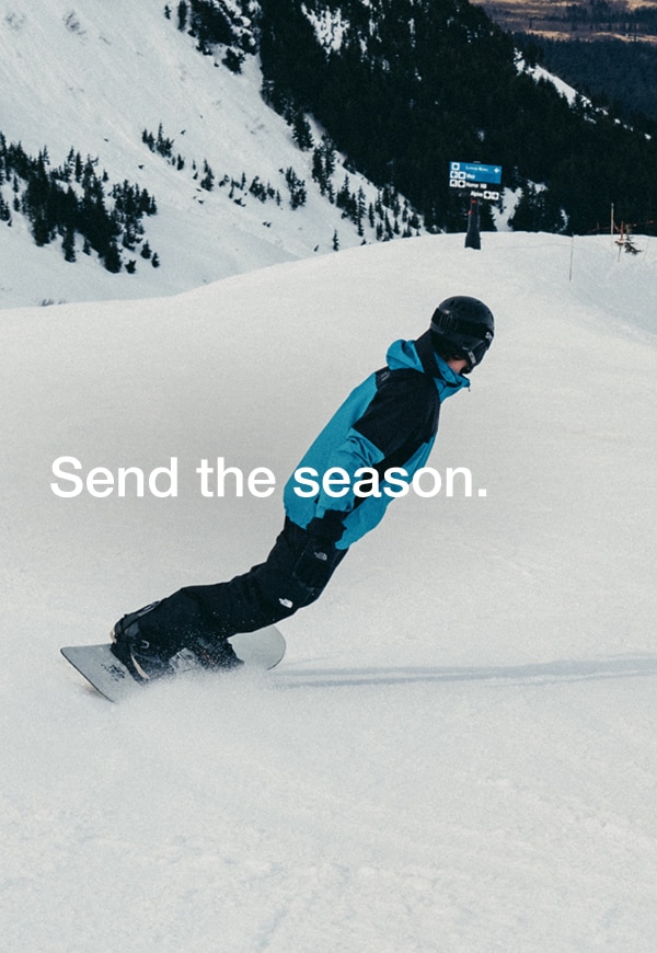 Two snowboarders ride down a snowy mountain, the woman wearing The North Face Women’s THERMOBALL™ Snow Triclimate® Jacket in Sumac/Mars Dust. A third image shows them hiking uphill with their boards in hand, surrounded by fresh powder and mountain views. 