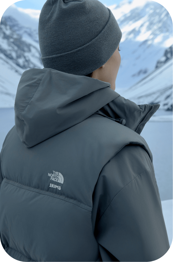 Grey The North Face x SKIMS jacket.