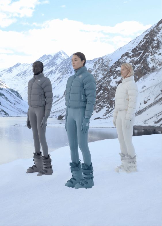 A video showing various skiers in formation wearing The North Face x SKIMS collection.