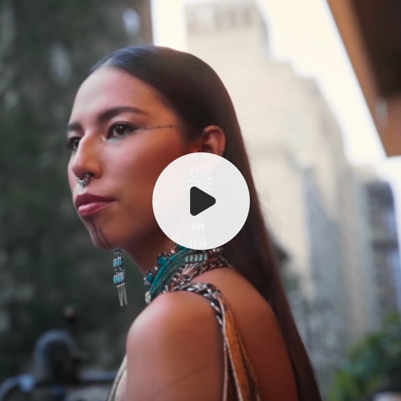 Video still and play button