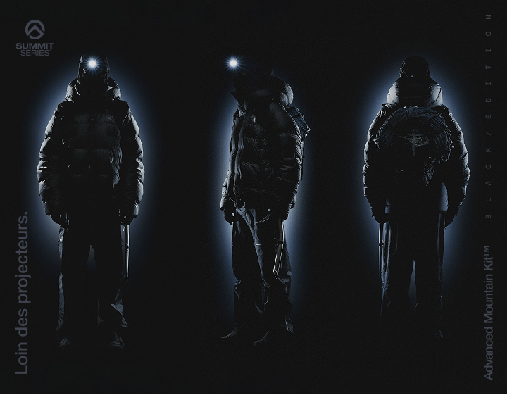 La collection Advanced Mountain Kit Édition Noire, comprenant le manteau, le sac à dos et les bottes sur un fond noir.