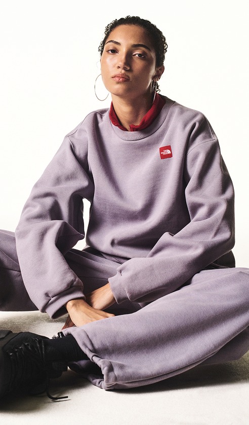 A woman in a crewneck