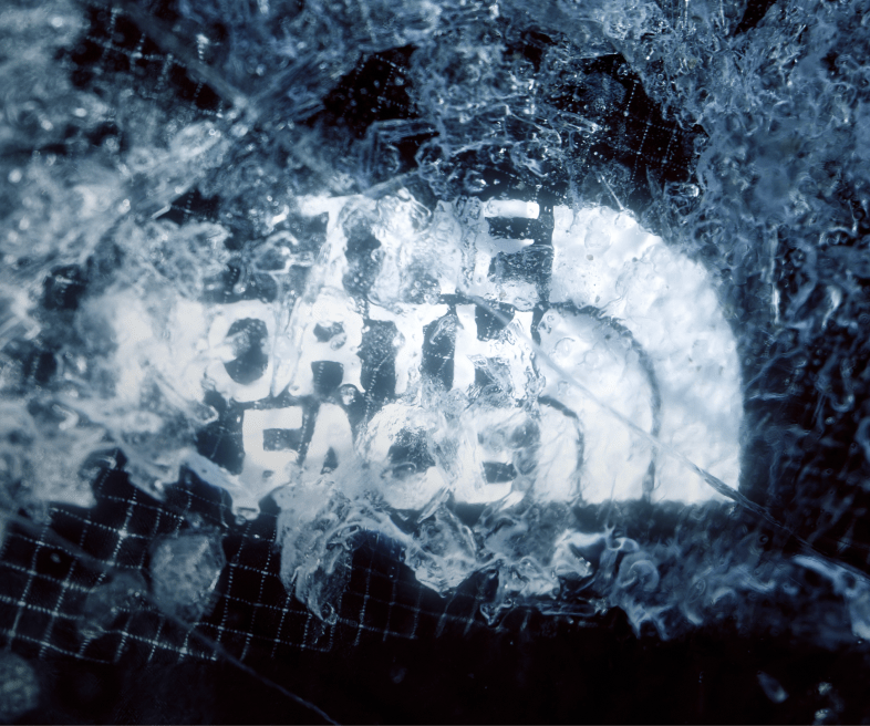 The North Face logo covered with ice