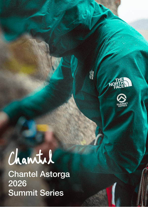 Athlete Chantel Astorga setting up climbing gear on a boulder.