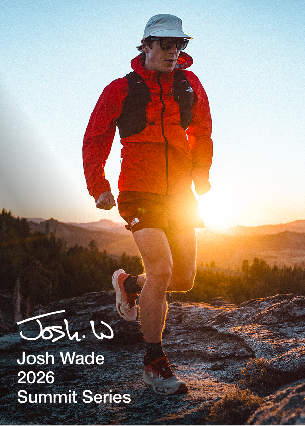 North Face Athlete running on a boulder with the sunset behind him. 