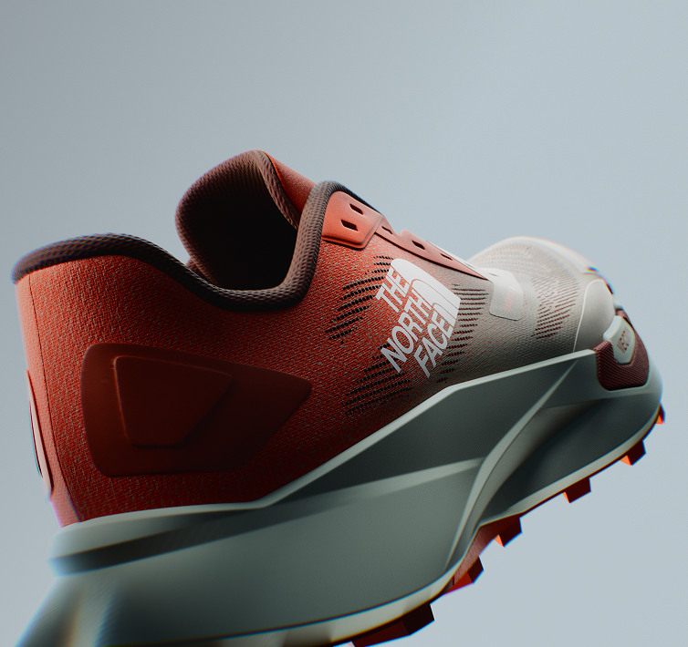 Back view of orange VECTIV™ Enduris 4 on gray background.