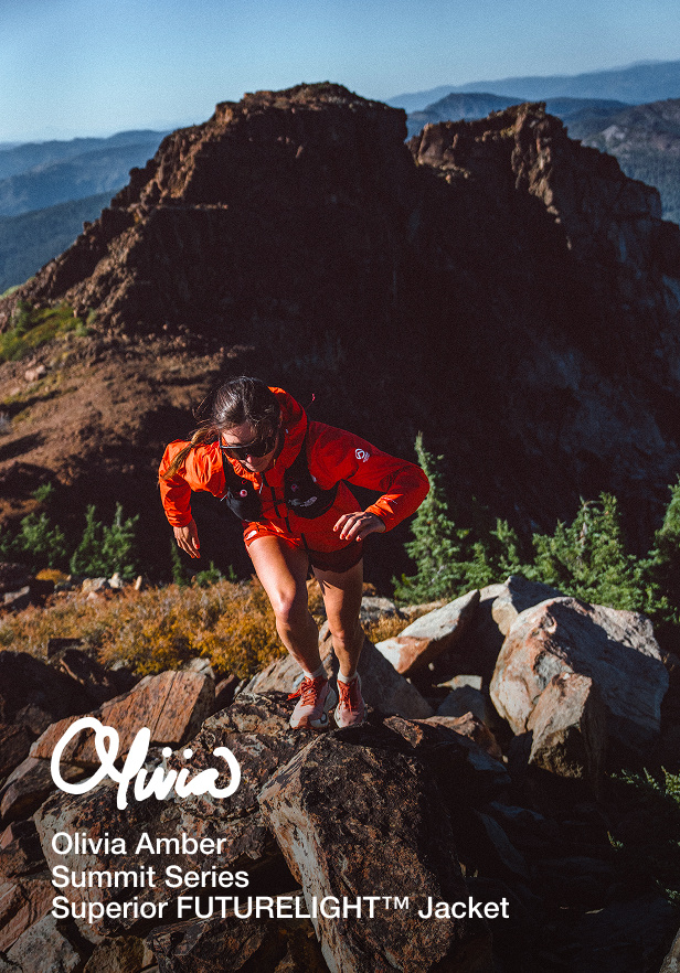 North face athlete Olivia Amber running up a mountain