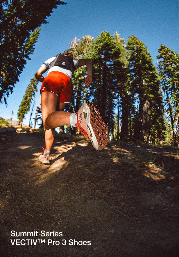 North face athlete running through trail close up of bottom of vectiv pro 3 shoes