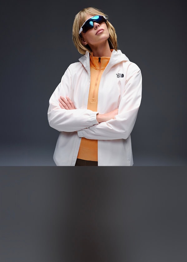 A man wearing The North Face Ridgelite jacket in blue.