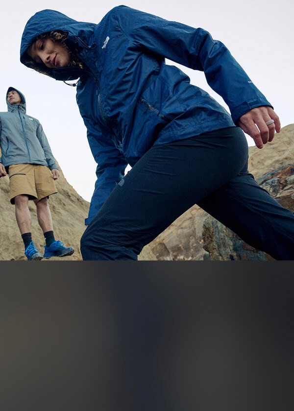 A man wearing The North Face Ridgelite jacket in blue.