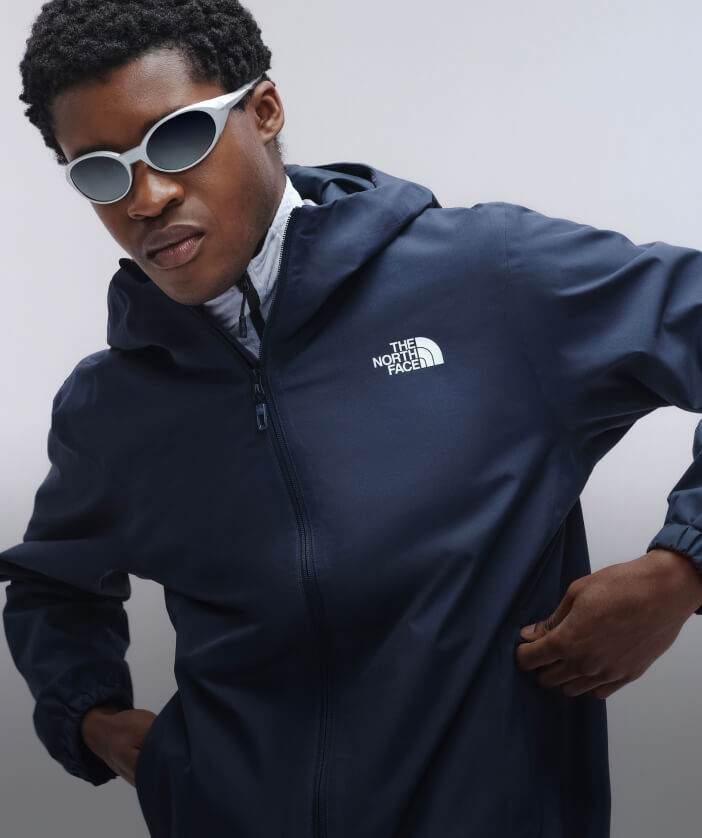 Man in a blue jacket.