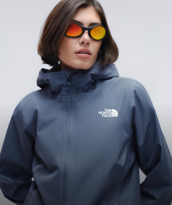 Woman in blue jacket.