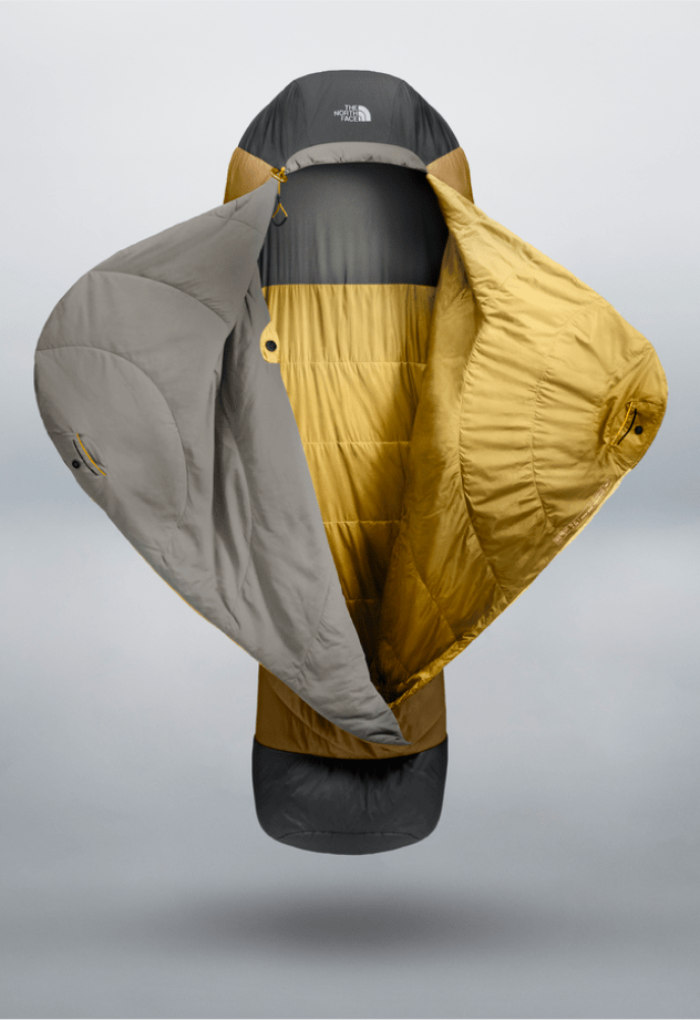Universal One Bag sleeping bag stood up vertically with flaps open looking like it wants to hug you.