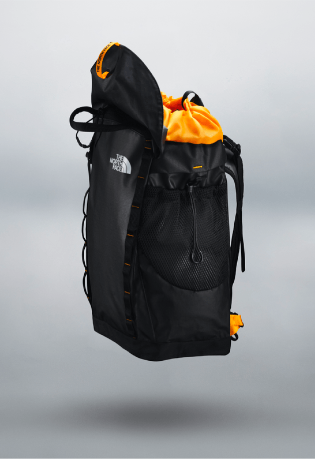 Black Universal Daypack 20L with top open.