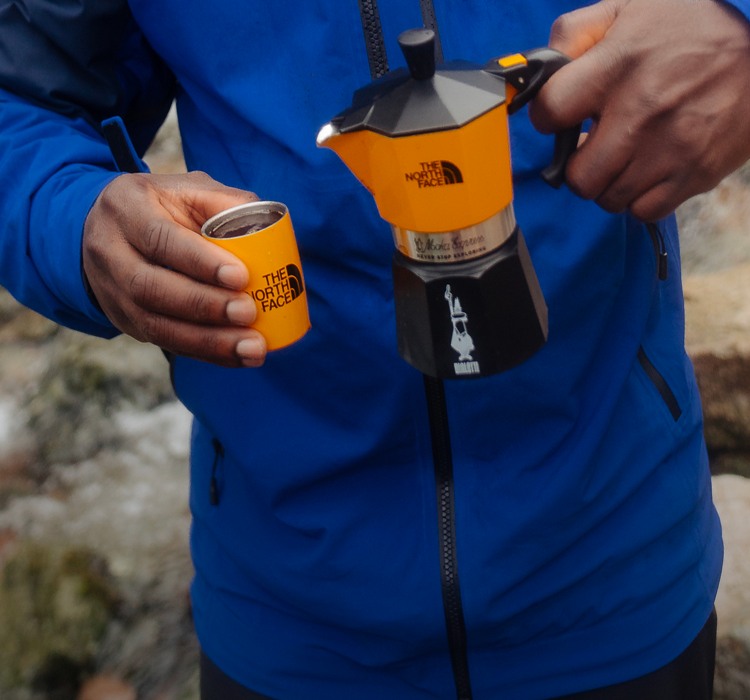 Closeup of The North Face branded Bialetti Moka Pot.