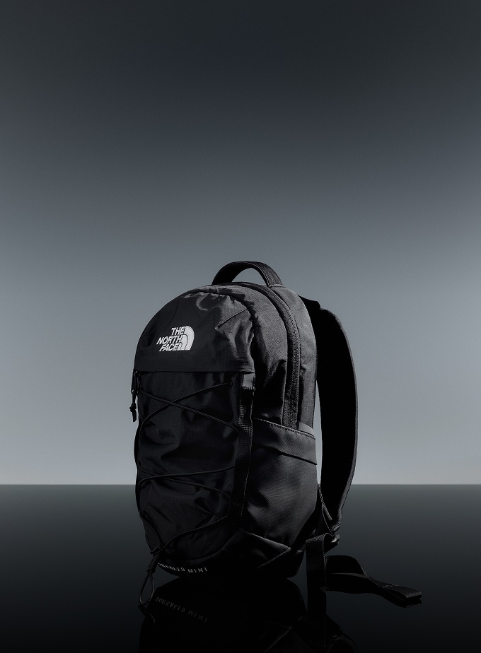 Black Borealis Mini Backpack sitting in a studio setting.