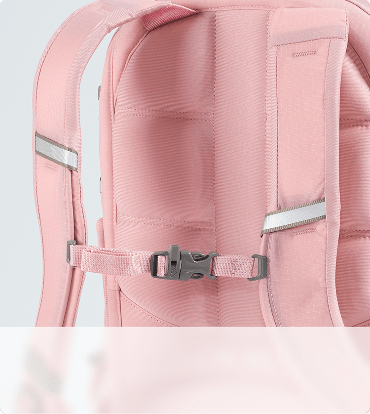 Closeup shot of a pink backpack showing the suspension system.