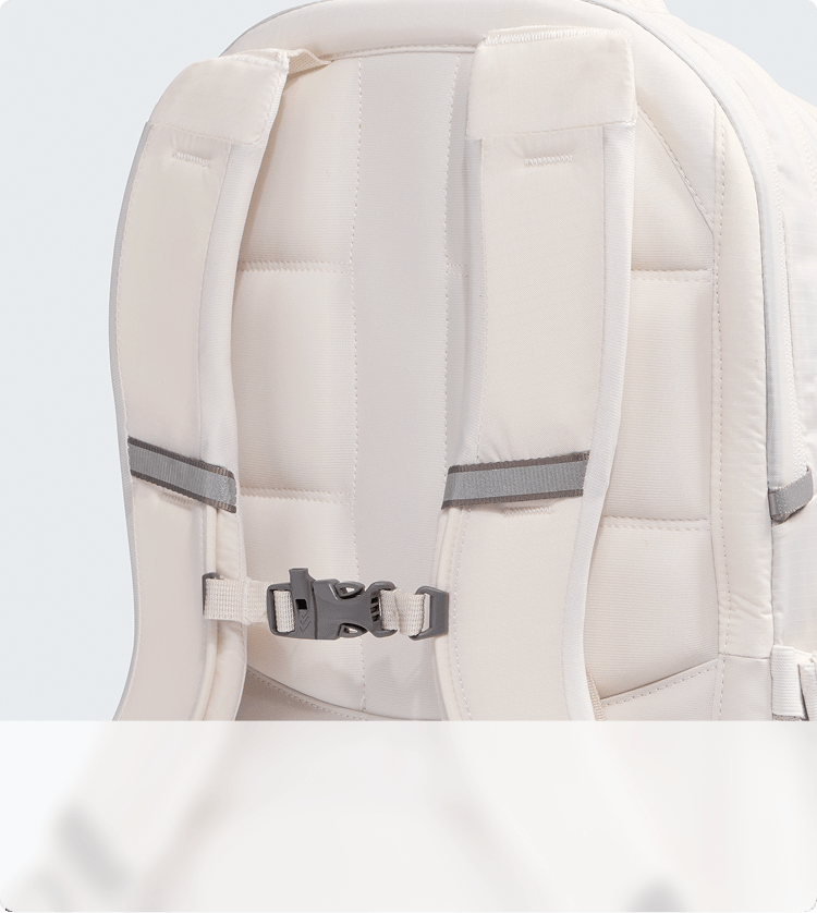 Closeup shot of a white backpack showing the suspension system.