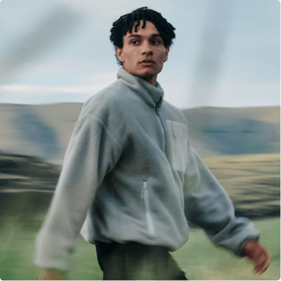 A man wearing a grey Yumiori fleece