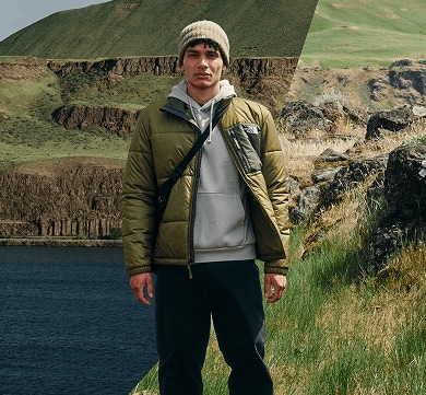A man standing wearing a green Nuketo jacket