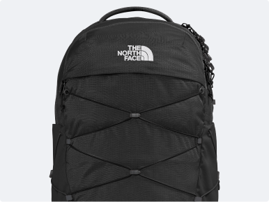 An image of a black backpack on a grey background