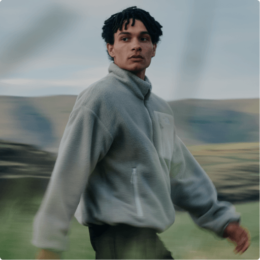 A man wearing a grey Yumiori fleece