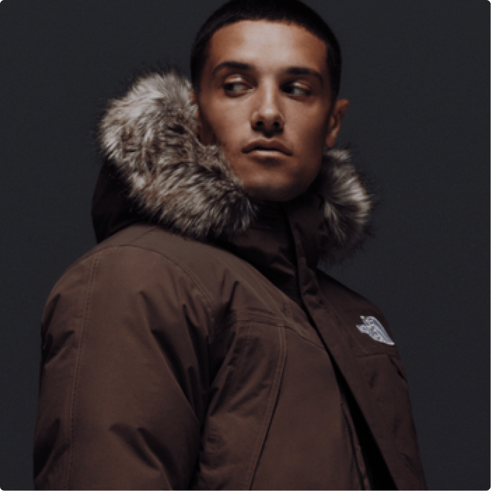 A man wearing a brown Mcmurdo jacket