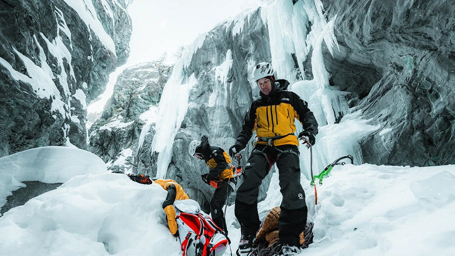 A group of climbers prepare for an icy passage.