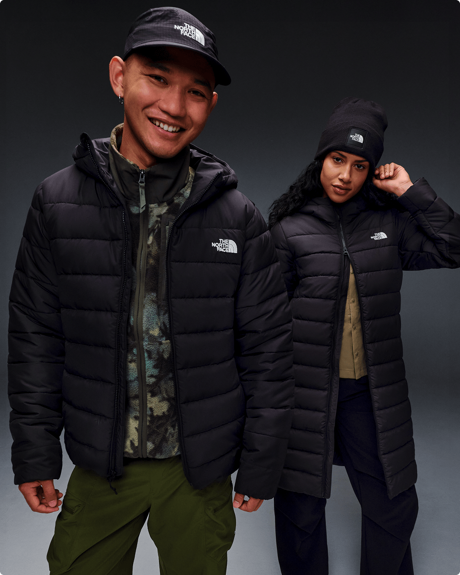 Man and woman wearing Acongagua Jackets