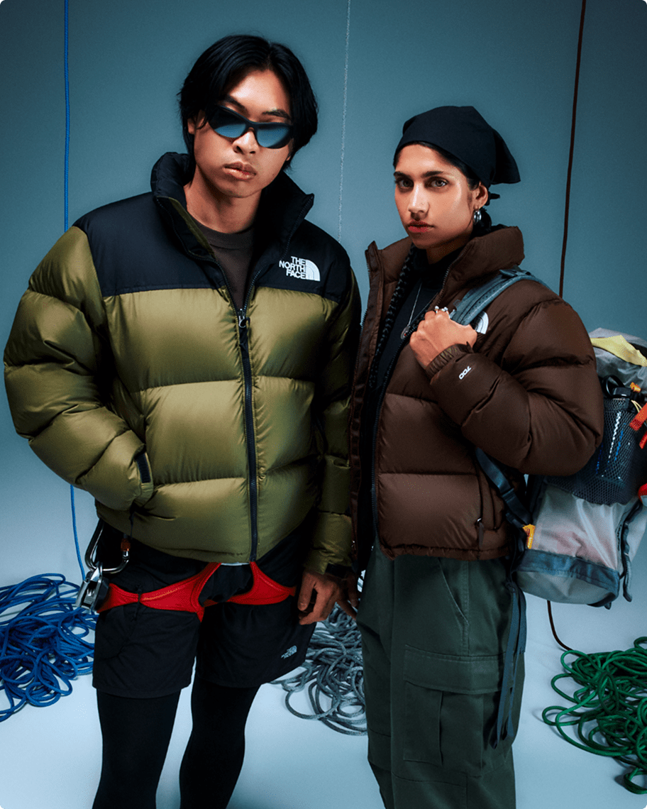 Man and woman wearing 1996 Retro Nuptses