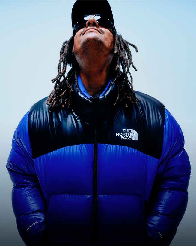 A closeup shot of a Nuptse jacket clearly showing The North Face logo.