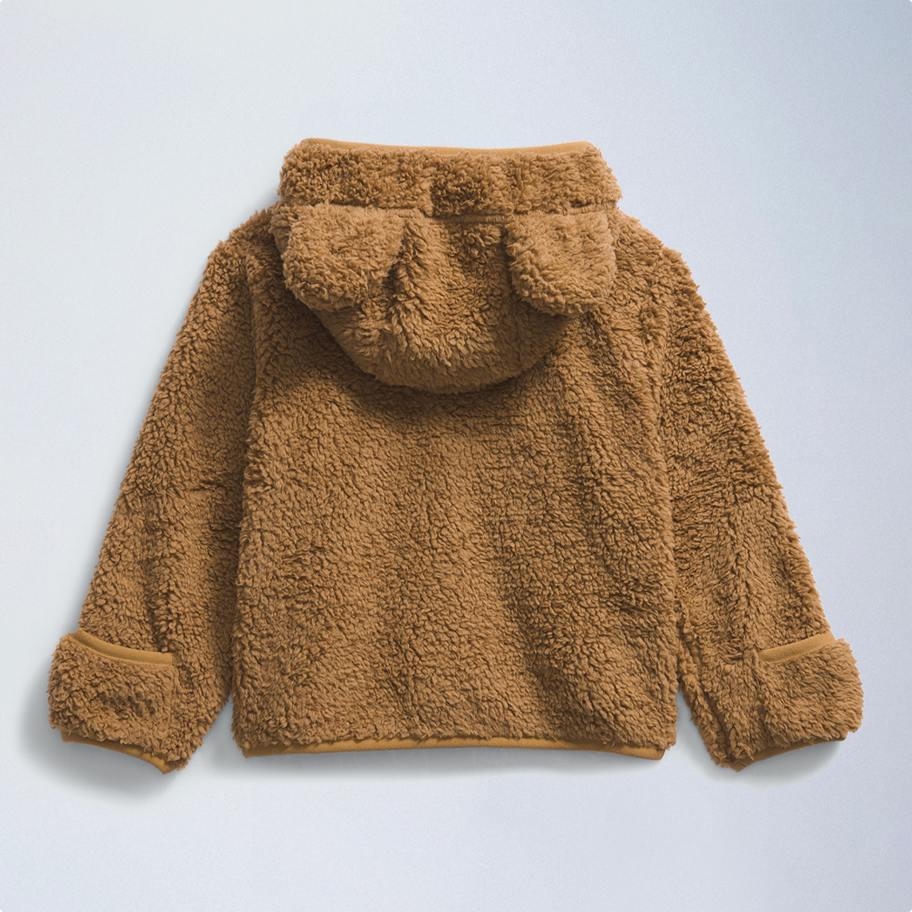 A lay down image of a furry jacket.