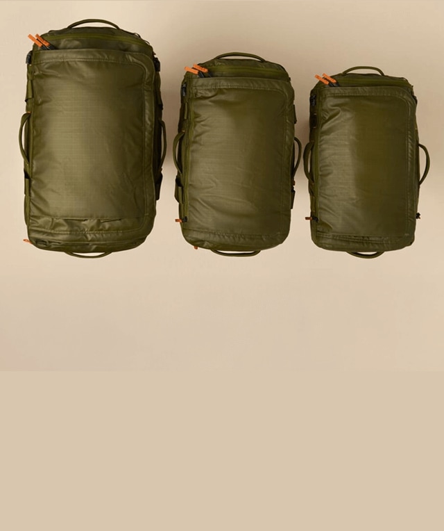 Overhead view of three Base Camp Voyager Duffels in different sizes.