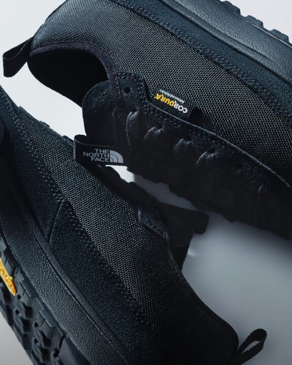 Close-up of The North Face Clyffe Shoes in TNF Black showing the textured upper and rugged outsole.
