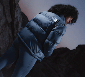 A woman wearing a monochromatic blue outfit from The North Face