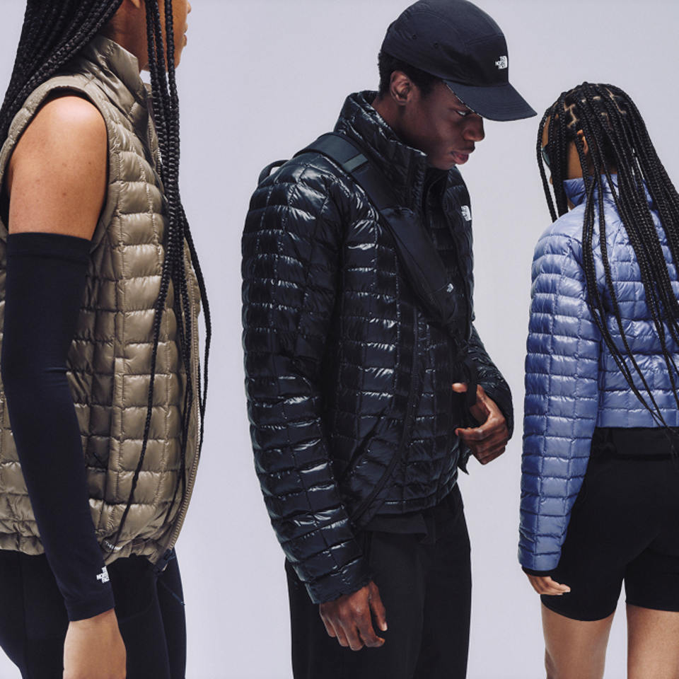 Studio shot of three people wearing the The North Face Thermoball Jackets