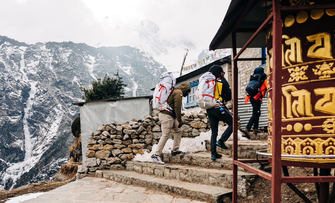 Team members pass through Namche Bazaar, the unofficial capital of the Khumbu region.