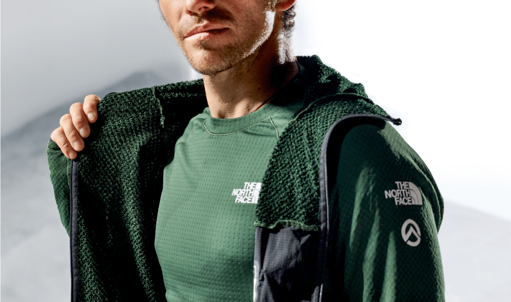 Person wearing The North Face Summit Series technical gear.