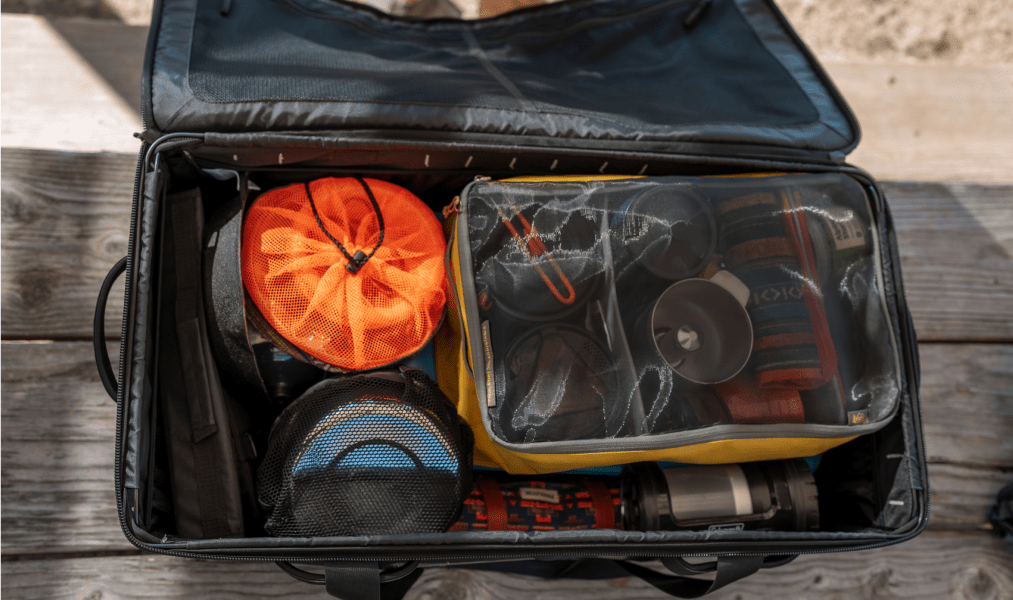 a north face gear box filled with camping gear